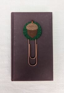 Wool felt topped jumbo paperclip bookmark with hand embroidered and appliqued acorn motif